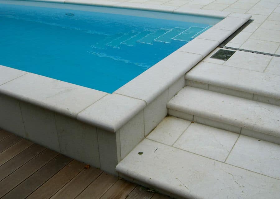 Limestone swimming pool surround