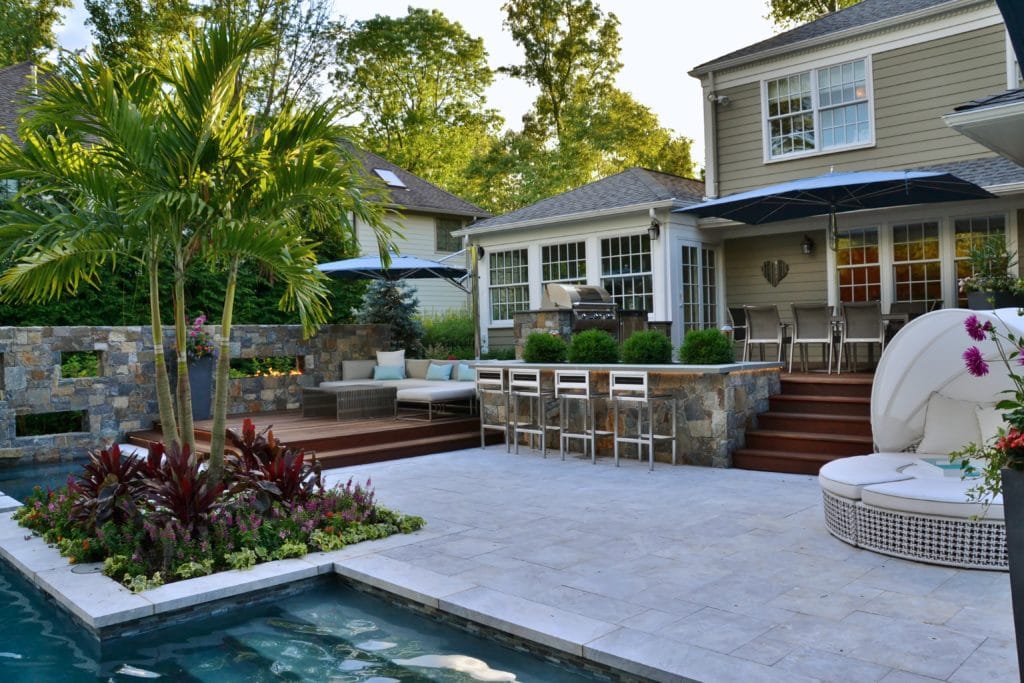 Spanish style terrace with pool and flagstones