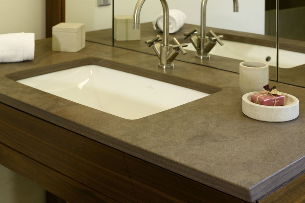 Luxury bathroom with brown sandstone washbasin