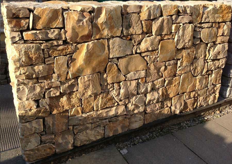 Quarry stone wall yellow limestone